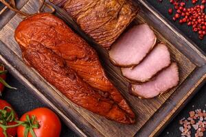 Delicious smoked meat pork or chicken with salt, spices and herbs photo