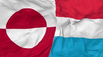 Groenlandia y Luxemburgo banderas juntos sin costura bucle fondo, serpenteado bache textura paño ondulación lento movimiento, 3d representación video