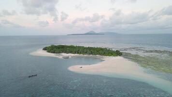 Aerial view Travel to the paradise sea beach. The Indonesia beaches. Travel to Island Banda Neira, idyllic tropical sea beach. Relax on an empty sea beach. video