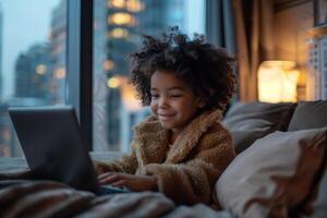 AI generated African American little girl uses laptop while sitting on bed. Children and technology, e-learning photo