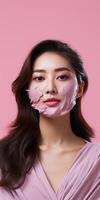 AI generated A beautiful young girl applies a berry pink cosmetic face mask. pink background. Generative AI photo
