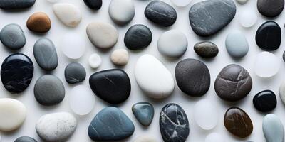 AI generated Beautiful round natural stones on a light background. View from above. Generative AI photo