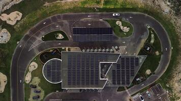 Aerial top sunset view of an innovative Electric Vehicle Charging Station video