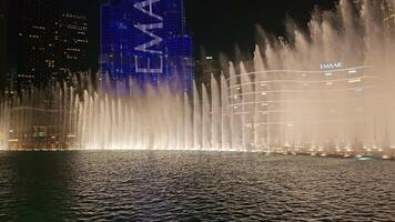 UAE, Dubai - United Arab Emirates 01 April 2024 Mesmerizing Water Show at Dubai's Downtown, The water show in Dubai's downtown dazzles with its grandeur and brilliant lighting, a feast for the eyes video