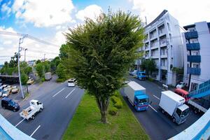 A traffic jam at the urban street in Tokyo fish eye shot photo