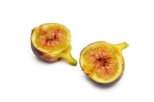 Fresh figs. Fruit with half and quarter isolated on white background. With clipping path. photo