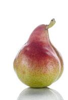 An upright ripe juicy golden and red pear isolated against a flat background. 2 photo