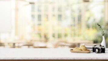 A dining table in a restaurant or coffee shop with a view from a garden on a sunny day. photo