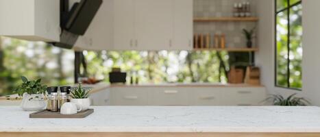 A white kitchen tabletop or kitchen island in a modern white and clean kitchen. photo