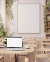 A laptop computer mockup on a wooden table in a beautiful minimalist restaurant of coffee shop. photo