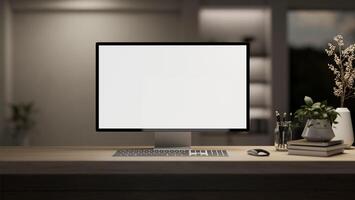 A computer desk in a modern room with a dim light, a PC computer white-screen mockup. photo