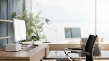 A side view image of a modern computer desk in a contemporary bright office. photo