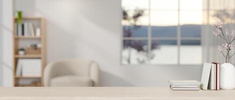 A minimalist wood table featuring a presentation space in a minimalist white living room. photo