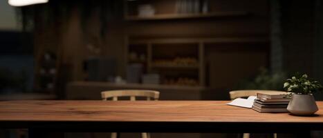 A presentation space on a rustic wooden desk in a dark neutral contemporary home office at night. photo