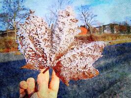 Digital watercolor style of a hand holding a leaf covered in snow crystals photo