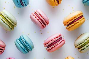 Macarons pattern on white background. Colorful french desserts. Top view photo