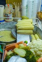 Boiled corn stand, typical Mexican street food. Food stall. photo