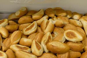 Bread stand in a supermarket. Fresh bread. photo