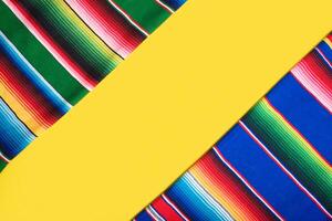 Serape on yellow background. Cinco de mayo background. photo