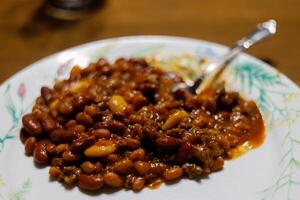 a plate full of Three Bean Casserole hot from the oven and ready to eat photo