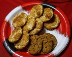 a plate of holiday cookies plated up to be sent home with someone photo