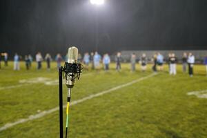 open mike night at a marching band rehearsal photo