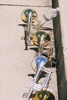 row of resting trumpets during marching practice photo