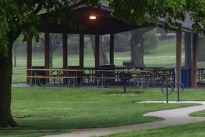 picnic tables in a pavilion are common gathering places all year round photo