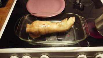 video of a stuffed pork leg just out of the oven and ready to be served photo