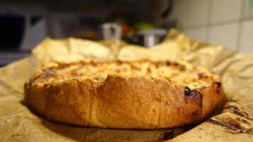 The cornice of a flan filled with pears, walnuts and gorgonzola cheese photo