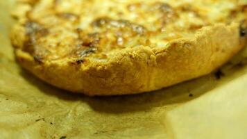 The cornice of a flan filled with pears, walnuts and gorgonzola cheese photo