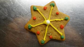Colored star shaped ginger cookie photo