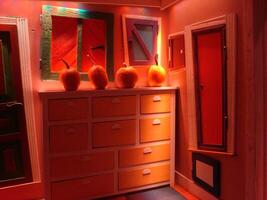 Colorful abstract doors and pumpkins during the Halloween period. photo