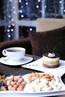 Table Set With Plates of Food and a Cup of Coffee photo