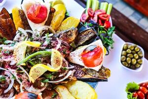 Delicious Plate of Food on a Wooden Table photo