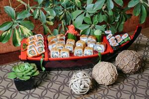 Boat Filled With Sushi on Table photo