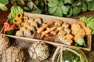 Wooden Tray Filled With Assorted Foods photo