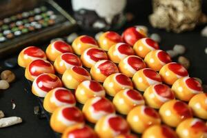 Close-Up of Colorful Candy Candies on Table photo