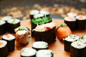 Abundance of Sushi on Wooden Table photo