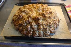 A loaf of bread with sesame seeds photo