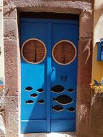 Bosa, Sardinia, Italy, Europe - August 12, 2019 Door of a house in the center photo