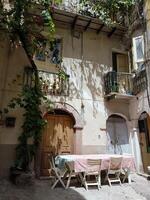 Bosa, Sardinia, Italy, Europe - August 12, 2019 courtyard in the historic center photo