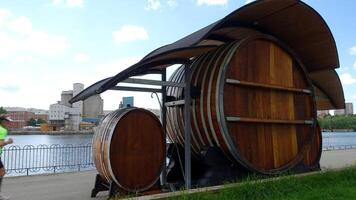 Stockholm, Sweden, June 10, 2022 A glimpse of a barrel bar along one of the city's canals photo