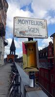 The signpost of a famous historic street in the center of Stockholm photo