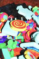 a pile of colored erasers of different shapes photo