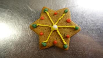 Colored star shaped ginger cookie photo