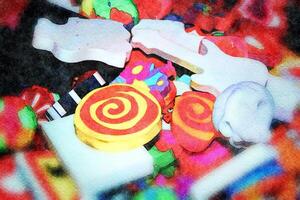 a pile of colored erasers of different shapes photo