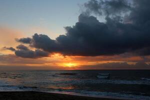 Lighting and color of the sky above the horizon at sunset. photo