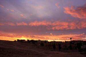 Lighting and color of the sky above the horizon at sunset. photo