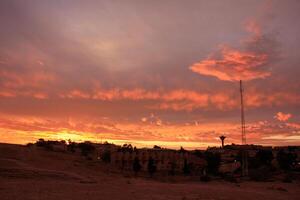 Lighting and color of the sky above the horizon at sunset. photo